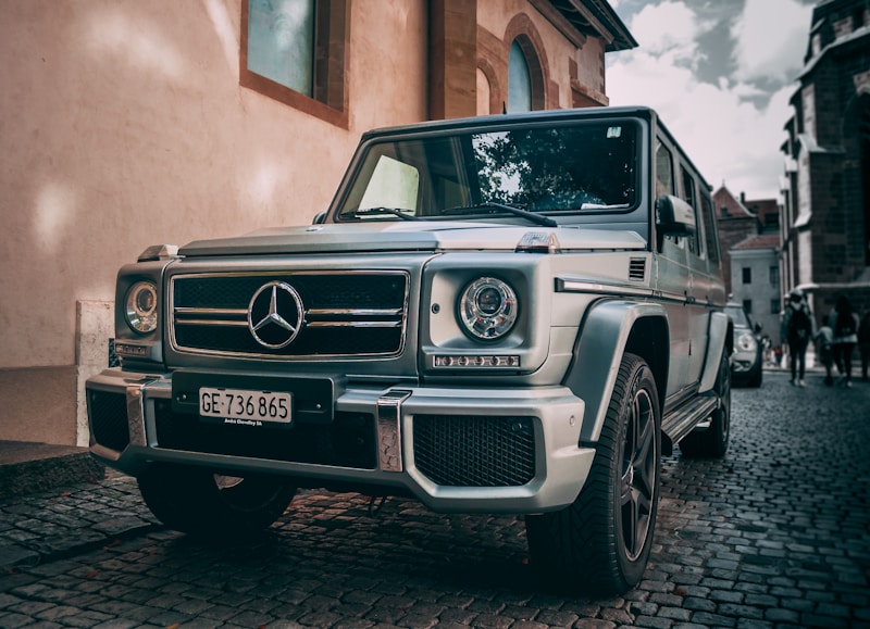 Silver Mercedes-Benz G-Class on a city street